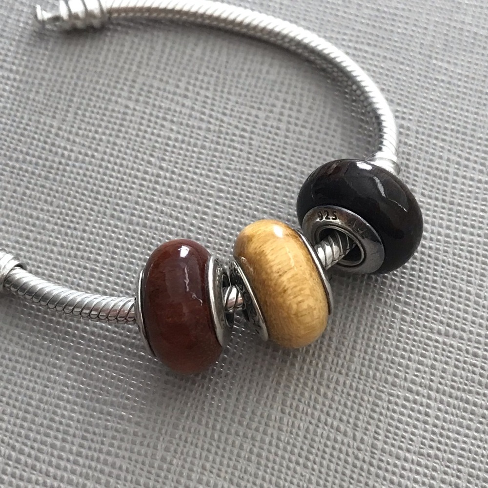 Retired Pandora wooden charms 45$each